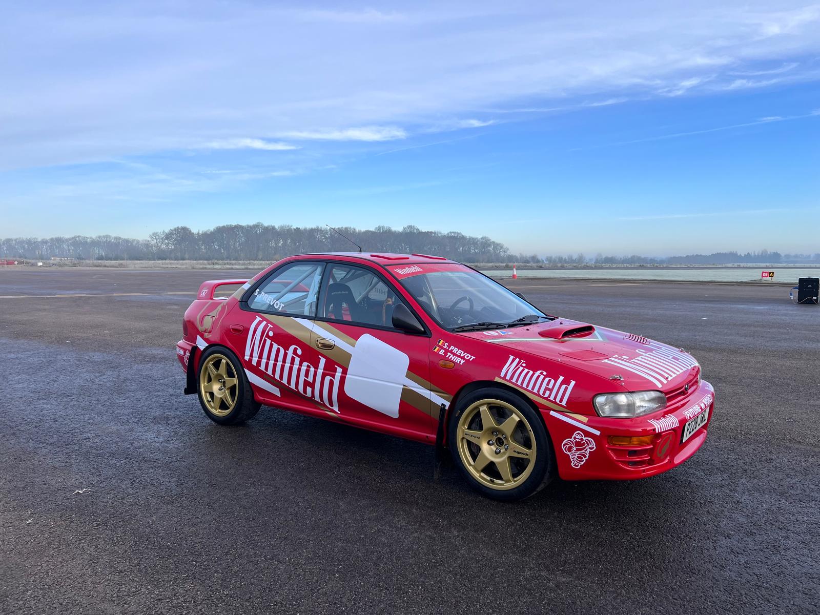 Inside the rebuild of a rare red Subaru Impreza 555 – DirtFish